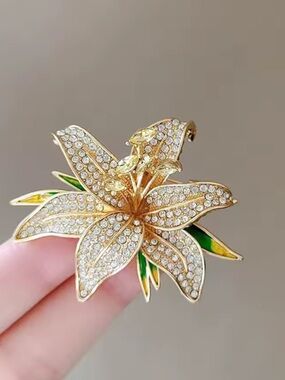 Gold-tone Crystal Lily Brooch with Green Enamel Accents